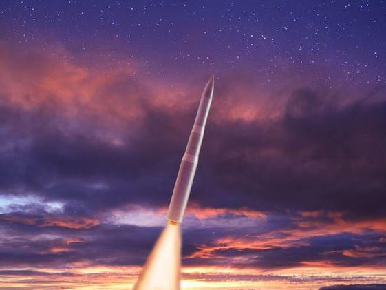 A rendering of the new LGM-35 Sentinel missile flying at twilight. (Credit: Northrop Grumman)